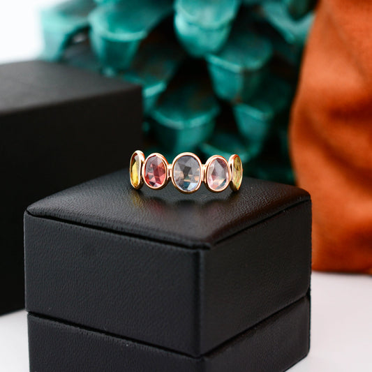 18K gold five stone ring with bezel-set multicolor sapphires