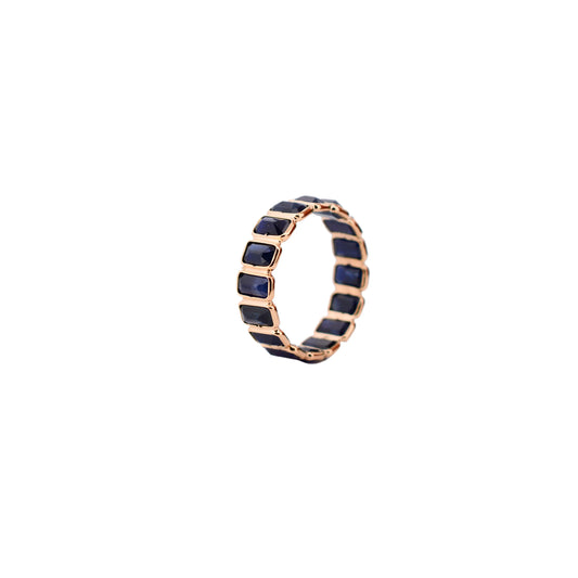 18K gold eternity ring with bezel-set emerald-cut blue sapphires