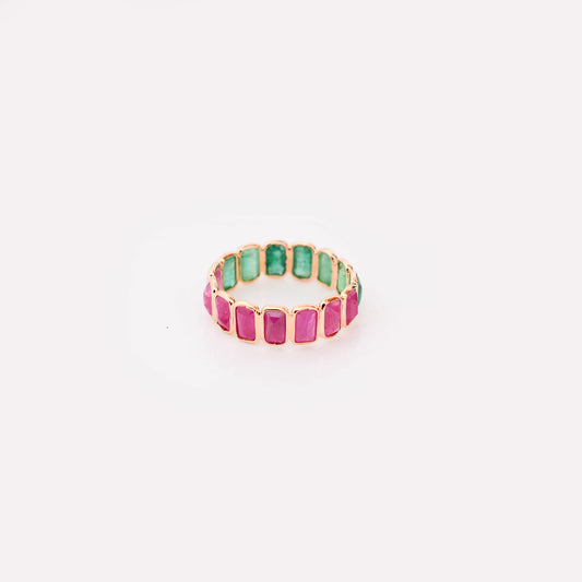18K gold eternity ring with emerald-cut emerald and ruby stones in a two-tone design