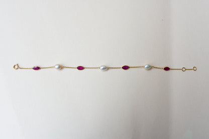 18K gold bracelet with ruby and pearl stations