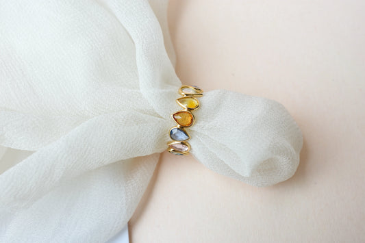 Pear-cut multicolor sapphire eternity ring in 18K gold, zigzag bezel setting