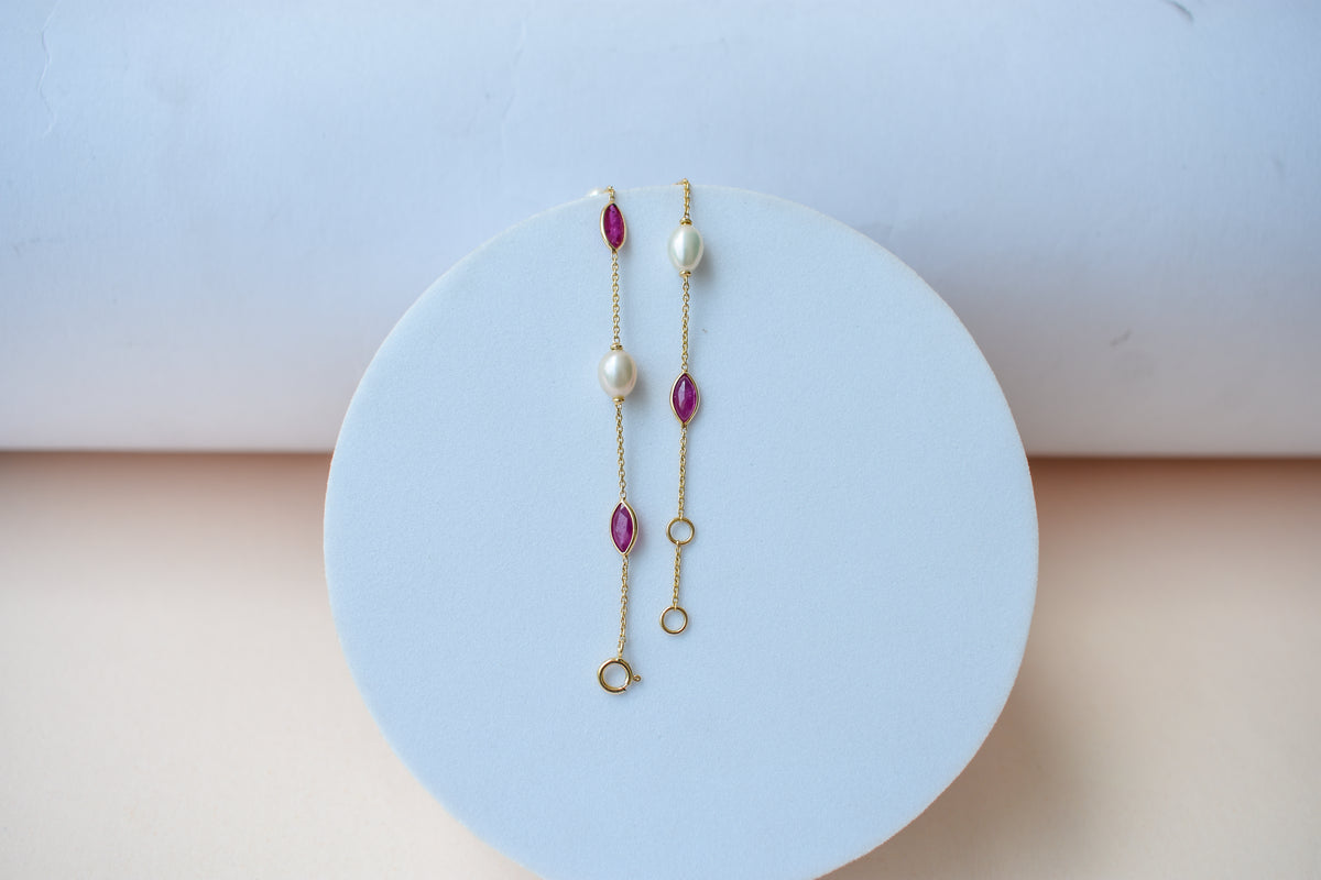 18K gold bracelet with ruby and pearl stations
