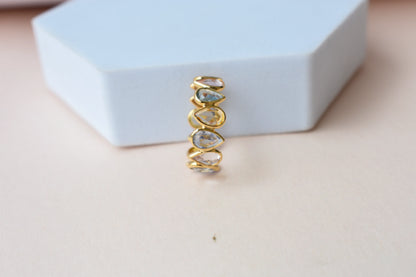 Pear-cut multicolor sapphire eternity ring in 18K gold, zigzag bezel setting