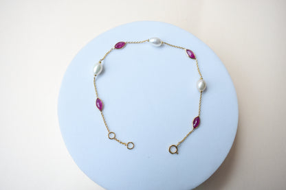 18K gold bracelet with ruby and pearl stations