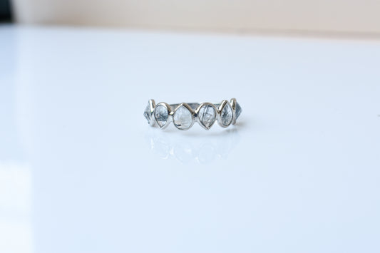 Rutilated quartz eternity band ring in 925 silver