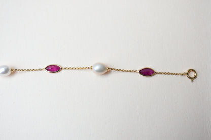 18K gold bracelet with ruby and pearl stations