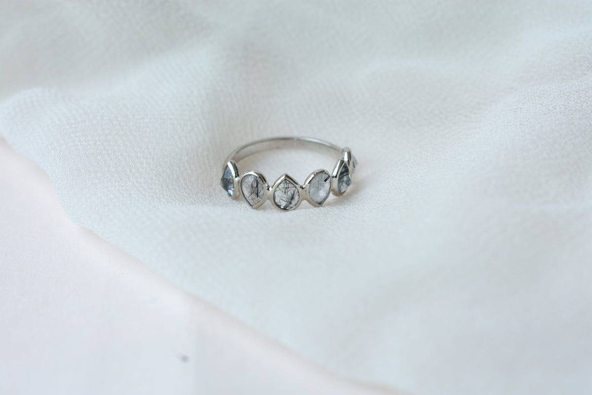 Rutilated quartz eternity band ring in 925 silver