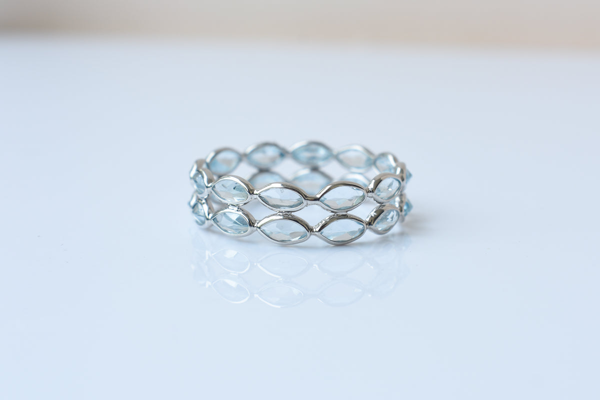 Sky blue topaz double row marquise eternity ring in 925 silver