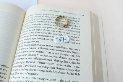 Oval-cut multicolor tourmaline double-row eternity ring in 18K gold