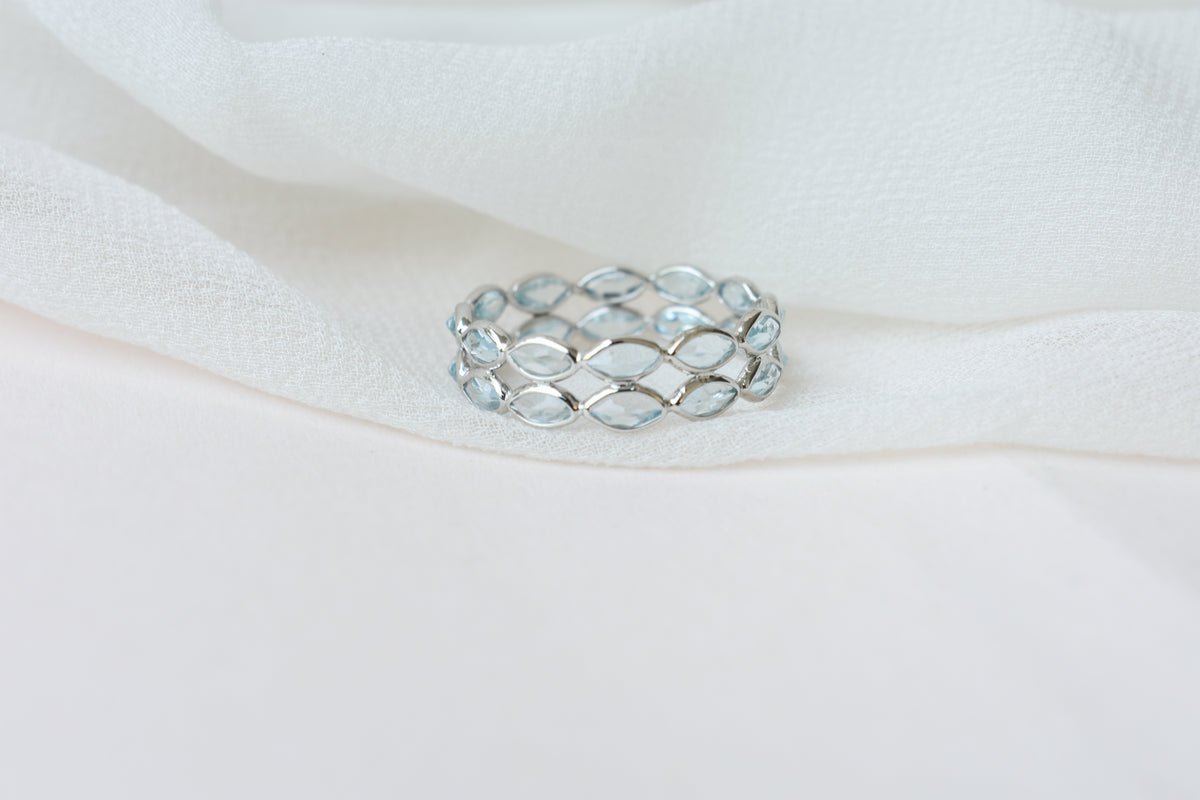 Sky blue topaz double row marquise eternity ring in 925 silver