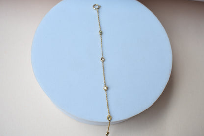 18K gold diamonds-by-the-yard bracelet with bezel-set round diamonds