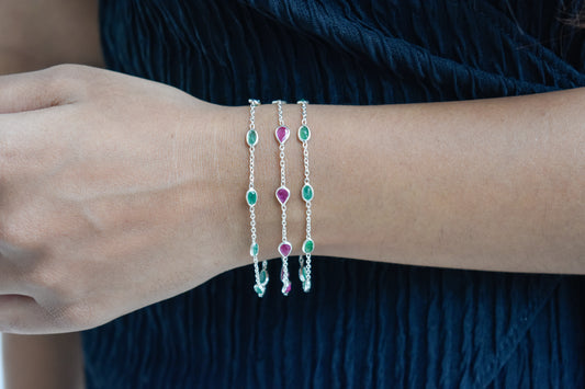 Multi gemstone three-strand bracelet in silver with pink and green stones