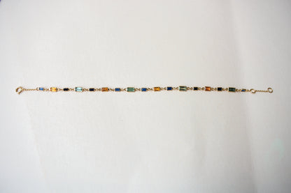 18K gold paperclip chain bracelet with multi-coloured sapphire stations