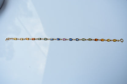 18K gold bracelet with multi-coloured sapphire stations