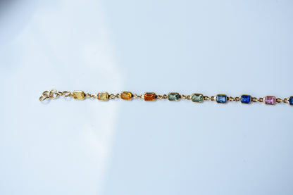 18K gold bracelet with multi-coloured sapphire stations