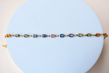 18K gold bracelet with multi-coloured sapphire stations