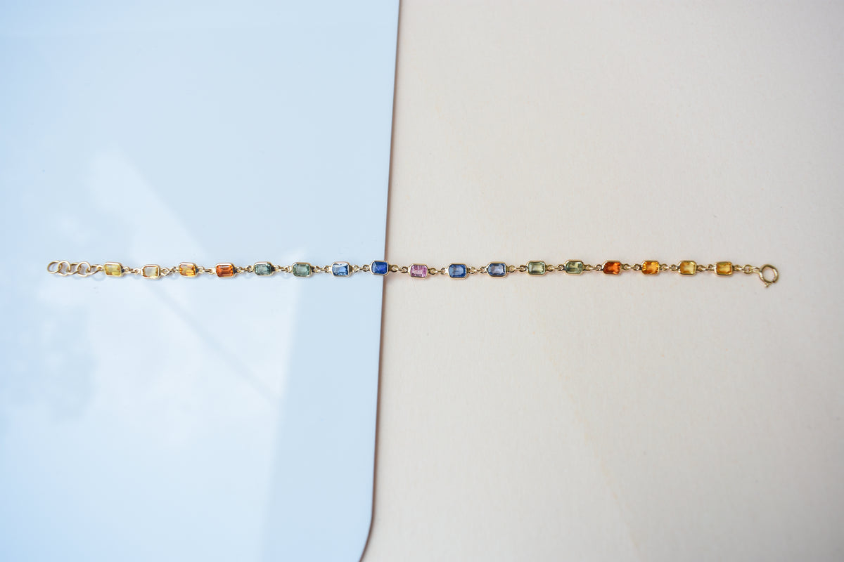 18K gold bracelet with multi-coloured sapphire stations