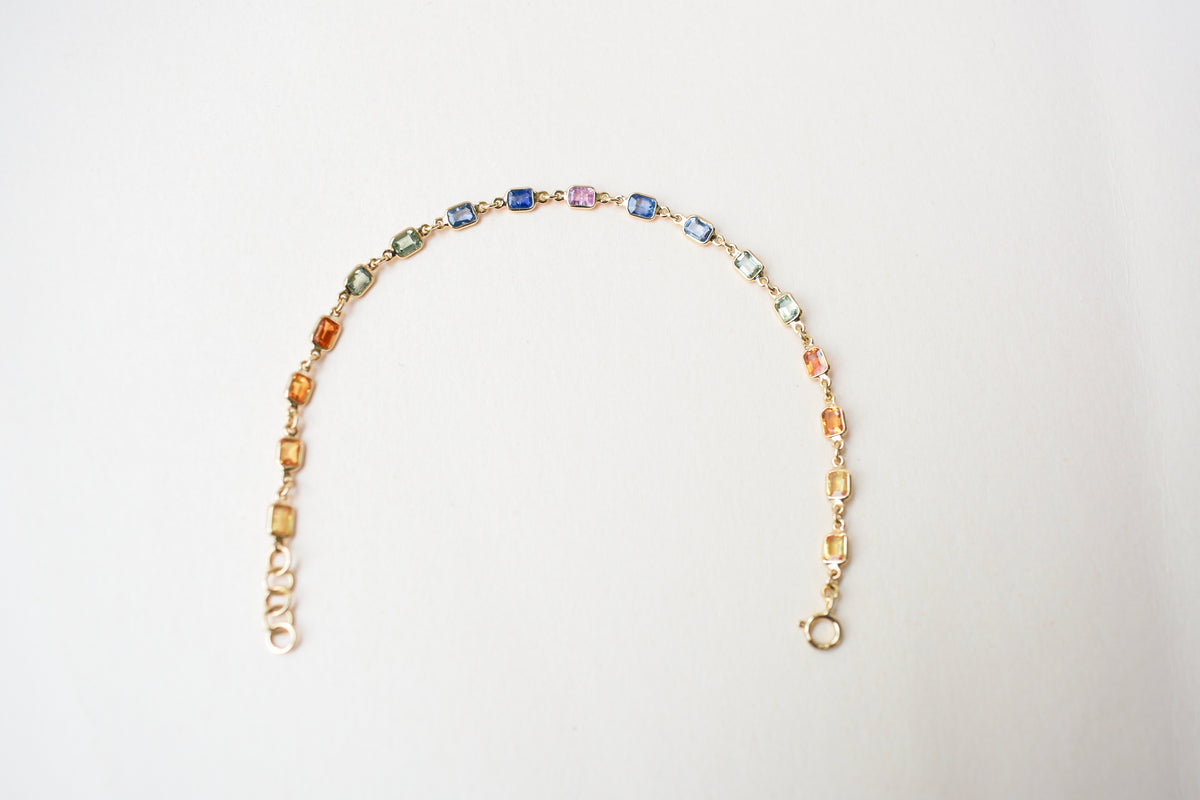 18K gold bracelet with multi-coloured sapphire stations
