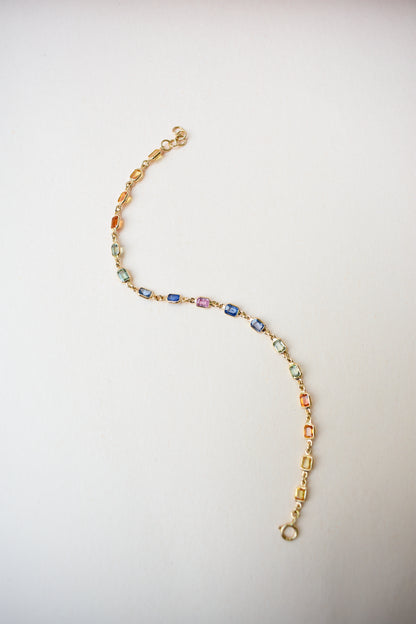18K gold bracelet with multi-coloured sapphire stations