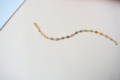 18K gold bracelet with multi-coloured sapphire stations