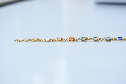 18K gold bracelet with multi-coloured sapphire stations