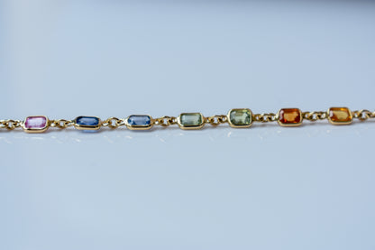 18K gold bracelet with multi-coloured sapphire stations