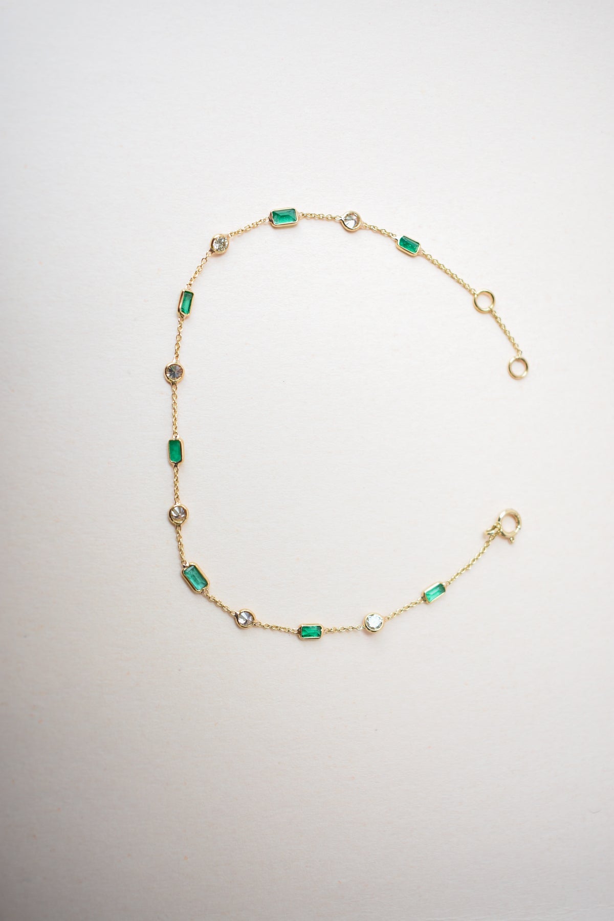 18K gold bracelet with emerald and diamond stations
