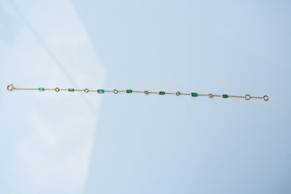 18K gold bracelet with emerald and diamond stations