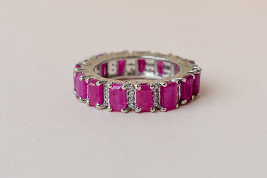 Vivid pink gemstone emerald-cut eternity ring in 925 silver