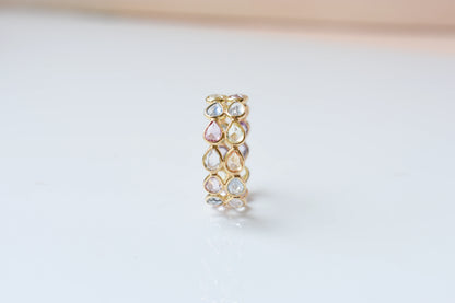 Pear-cut pastel multicolor sapphire eternity ring in 18K gold