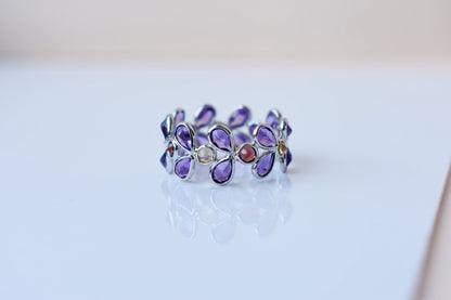 Multi gemstone marquise eternity ring in 925 silver with amethyst, garnet, and citrine-toned stones