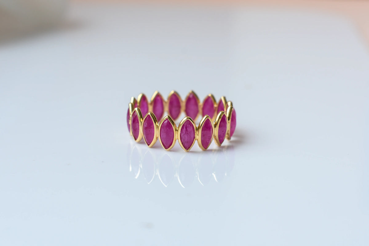 Marquise-cut ruby zigzag double-row eternity ring in 18K gold