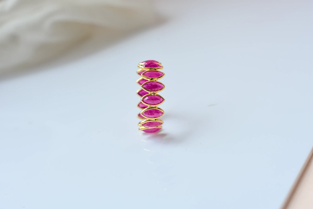 Marquise-cut ruby zigzag double-row eternity ring in 18K gold