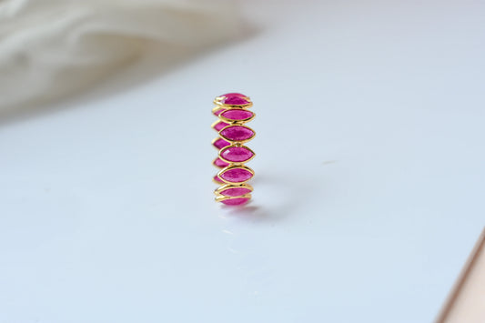 Marquise-cut ruby zigzag double-row eternity ring in 18K gold