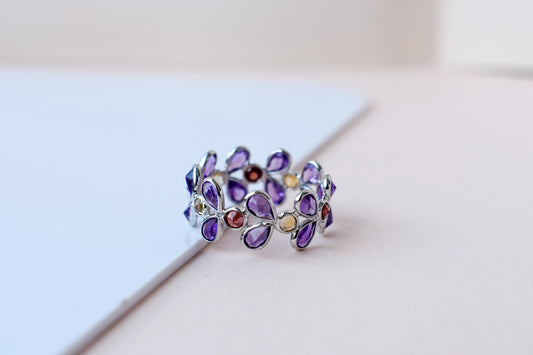 Multi gemstone marquise eternity ring in 925 silver with amethyst, garnet, and citrine-toned stones
