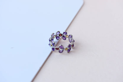 Multi gemstone marquise eternity ring in 925 silver with amethyst, garnet, and citrine-toned stones