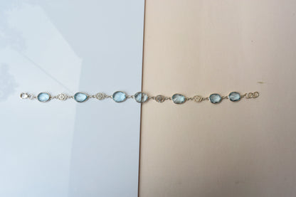 Blue gemstone bezel bracelet in silver with lobster clasp