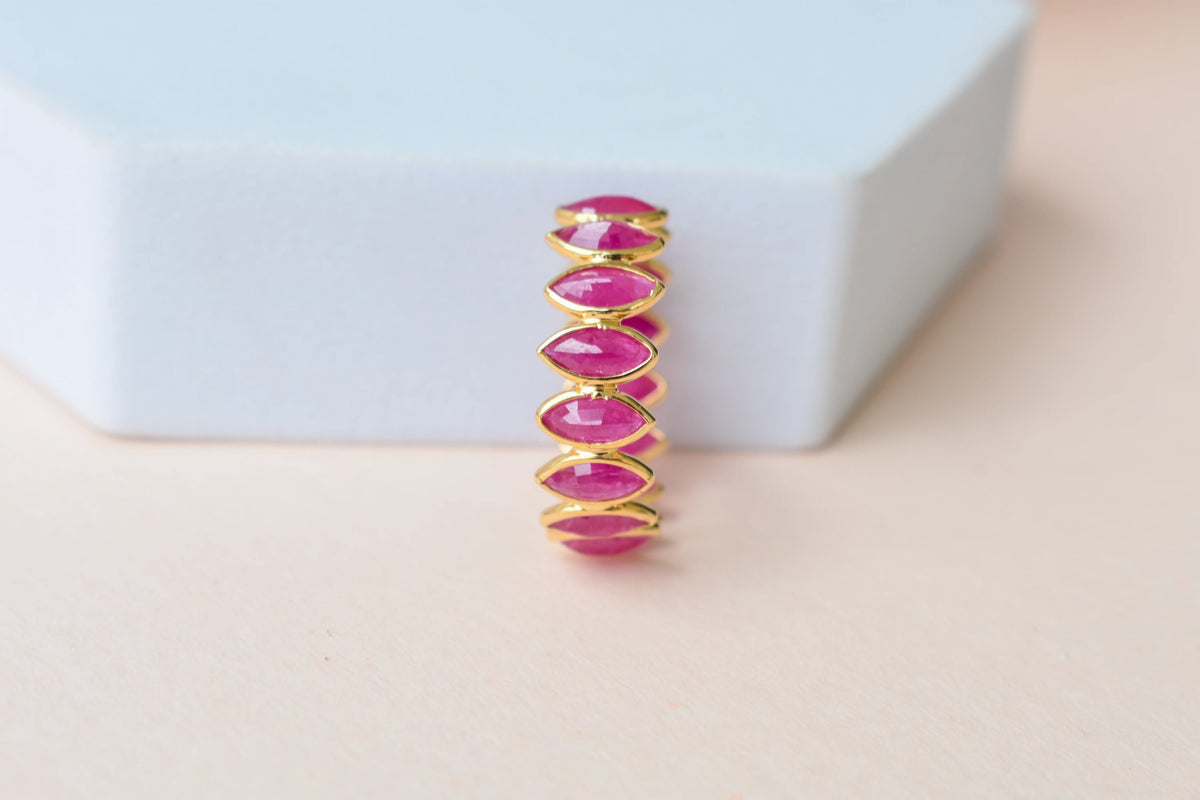 Marquise-cut ruby zigzag double-row eternity ring in 18K gold
