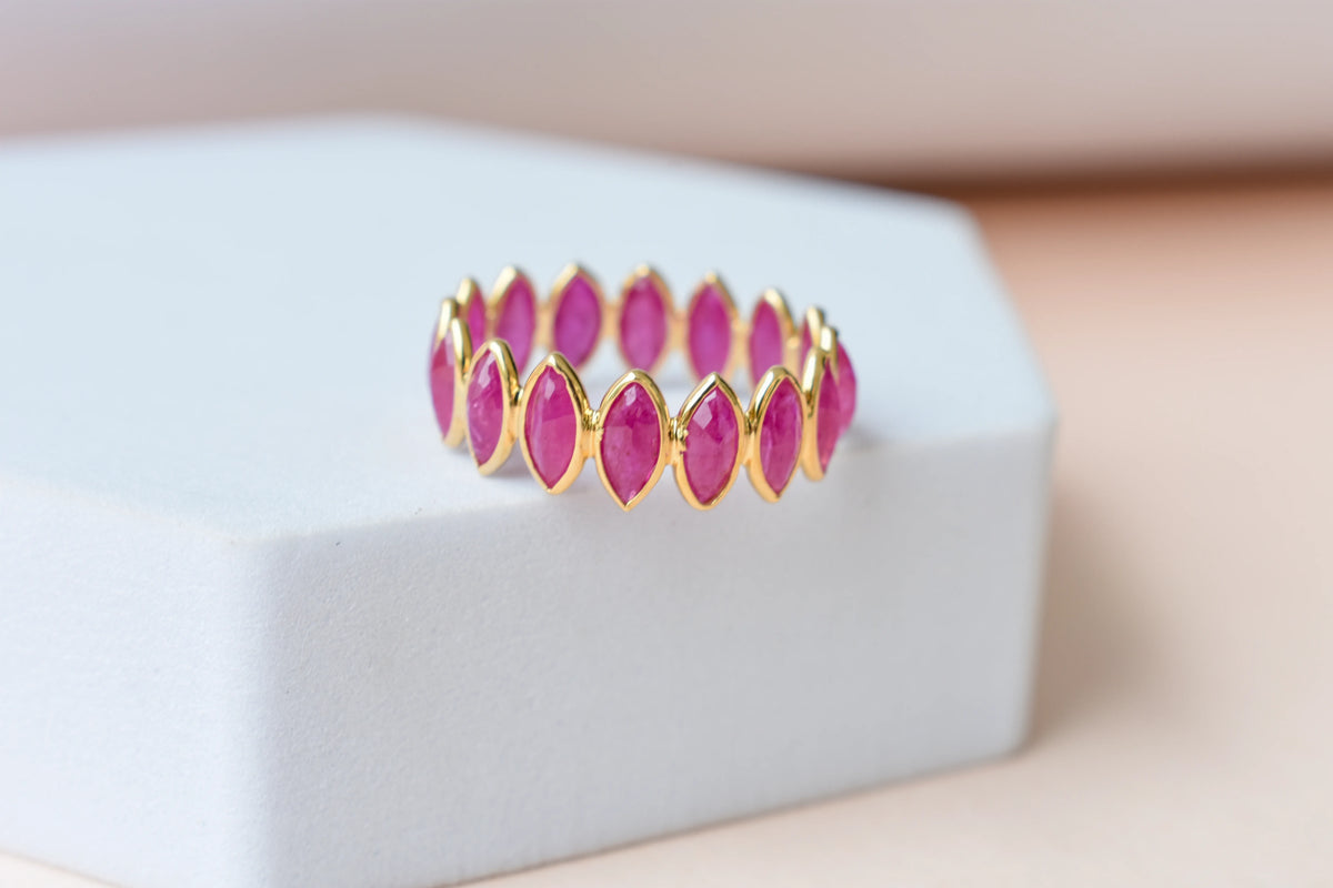 Marquise-cut ruby zigzag double-row eternity ring in 18K gold