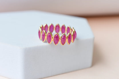Marquise-cut ruby zigzag double-row eternity ring in 18K gold