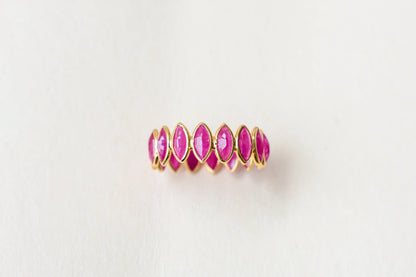 Marquise-cut ruby zigzag double-row eternity ring in 18K gold