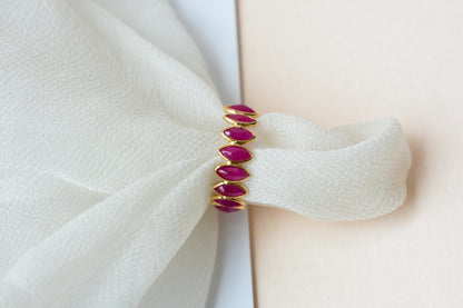 Marquise-cut ruby zigzag double-row eternity ring in 18K gold