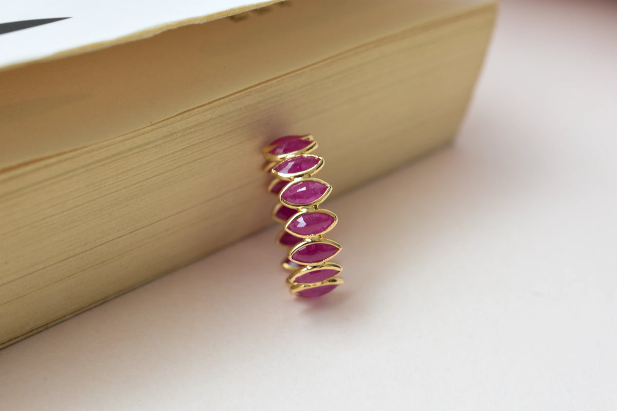 Marquise-cut ruby zigzag double-row eternity ring in 18K gold