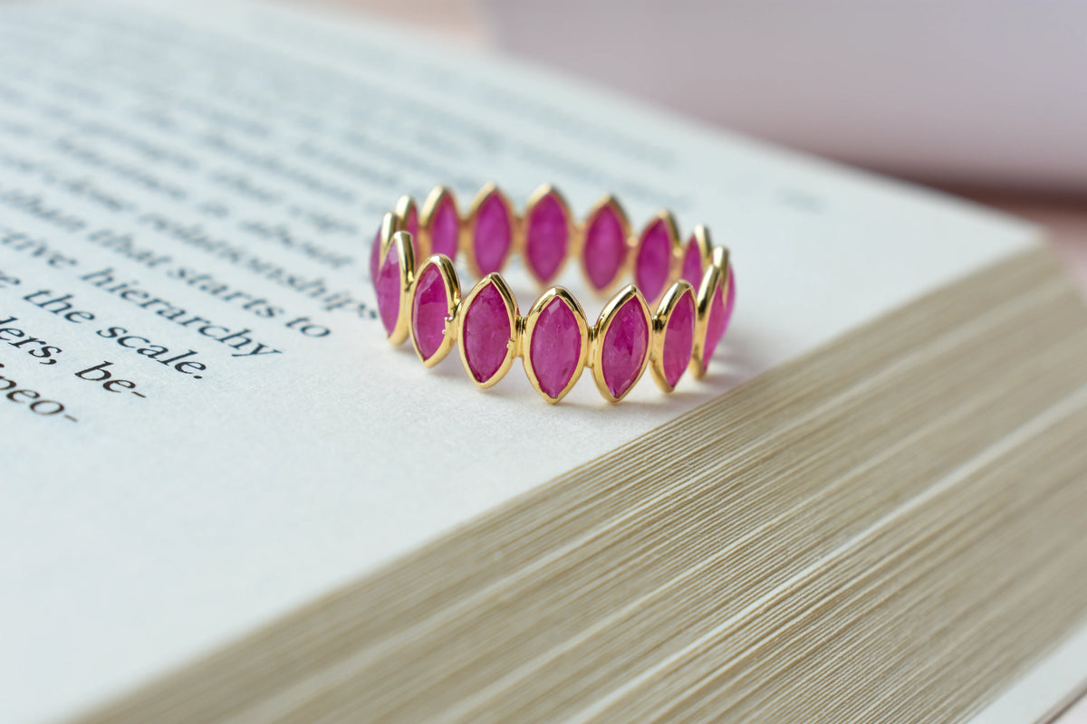 Marquise-cut ruby zigzag double-row eternity ring in 18K gold