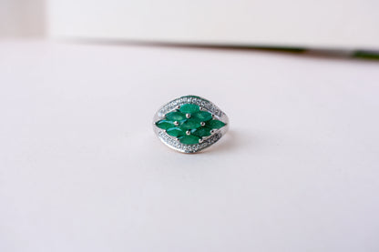 Emerald cluster ring in 925 silver with marquise-cut emeralds and cubic zirconia band