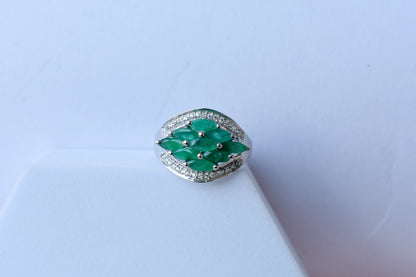 Emerald cluster ring in 925 silver with marquise-cut emeralds and cubic zirconia band