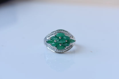 Emerald cluster ring in 925 silver with marquise-cut emeralds and cubic zirconia band