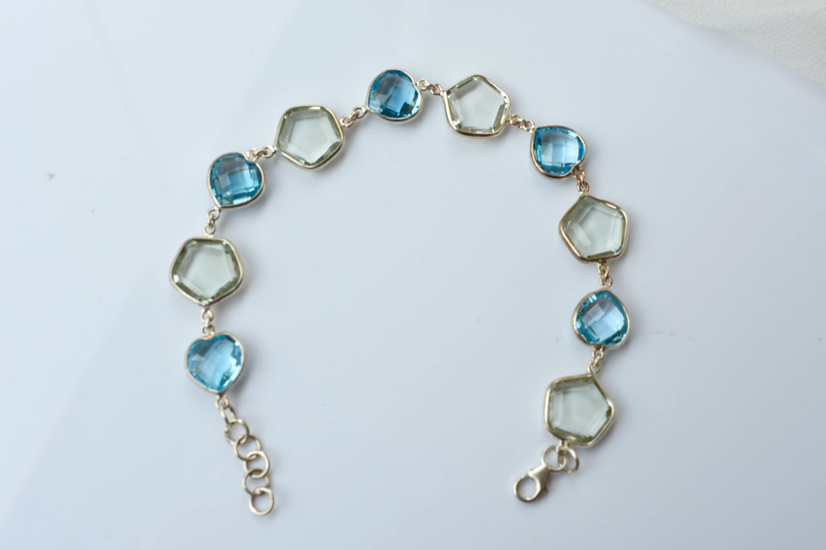Green amethyst and sky blue topaz bezel bracelet in 925 silver