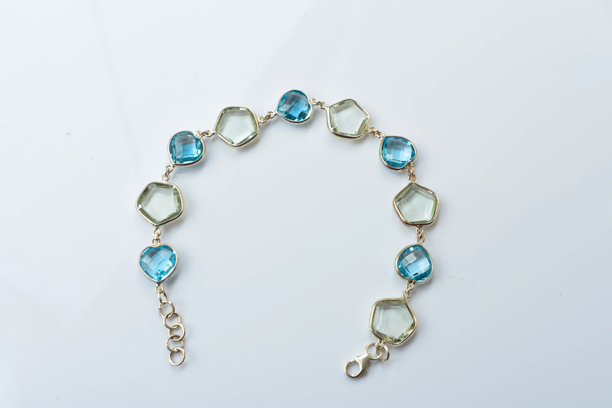 Green amethyst and sky blue topaz bezel bracelet in 925 silver