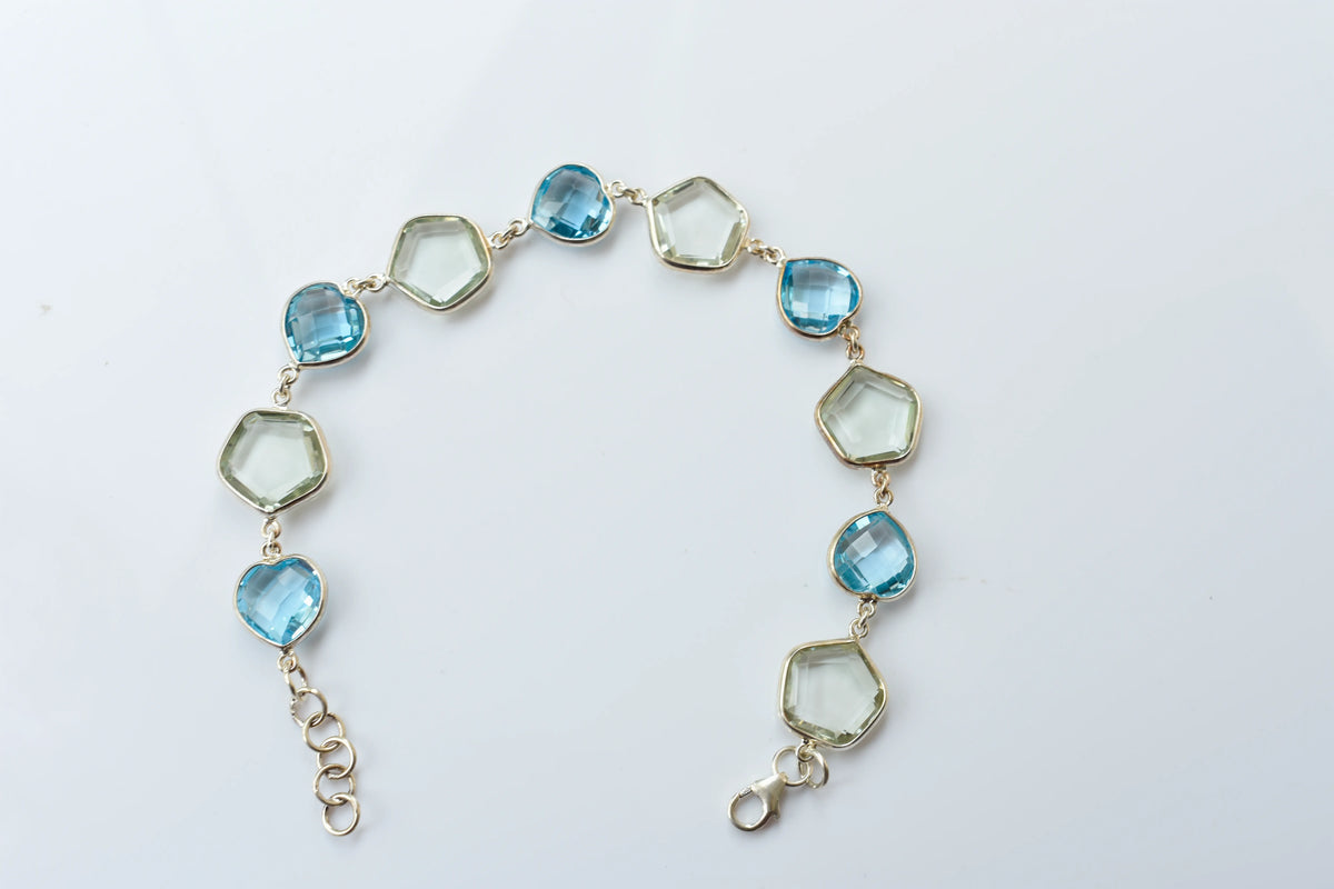 Green amethyst and sky blue topaz bezel bracelet in 925 silver
